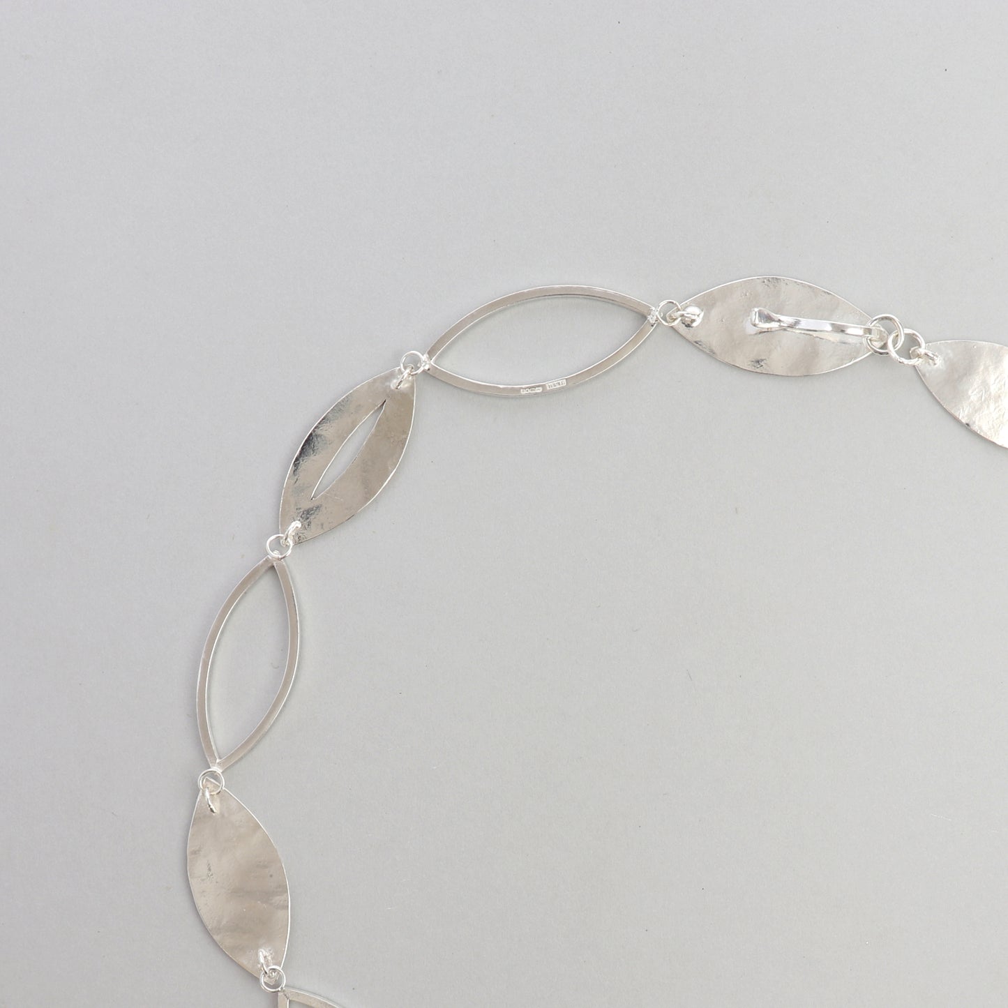 Reverse view of the handcrafted Marquise Statement Necklace showing the integrated concealed clasp designed to blend seamlessly into the necklace for secure, easy fastening.