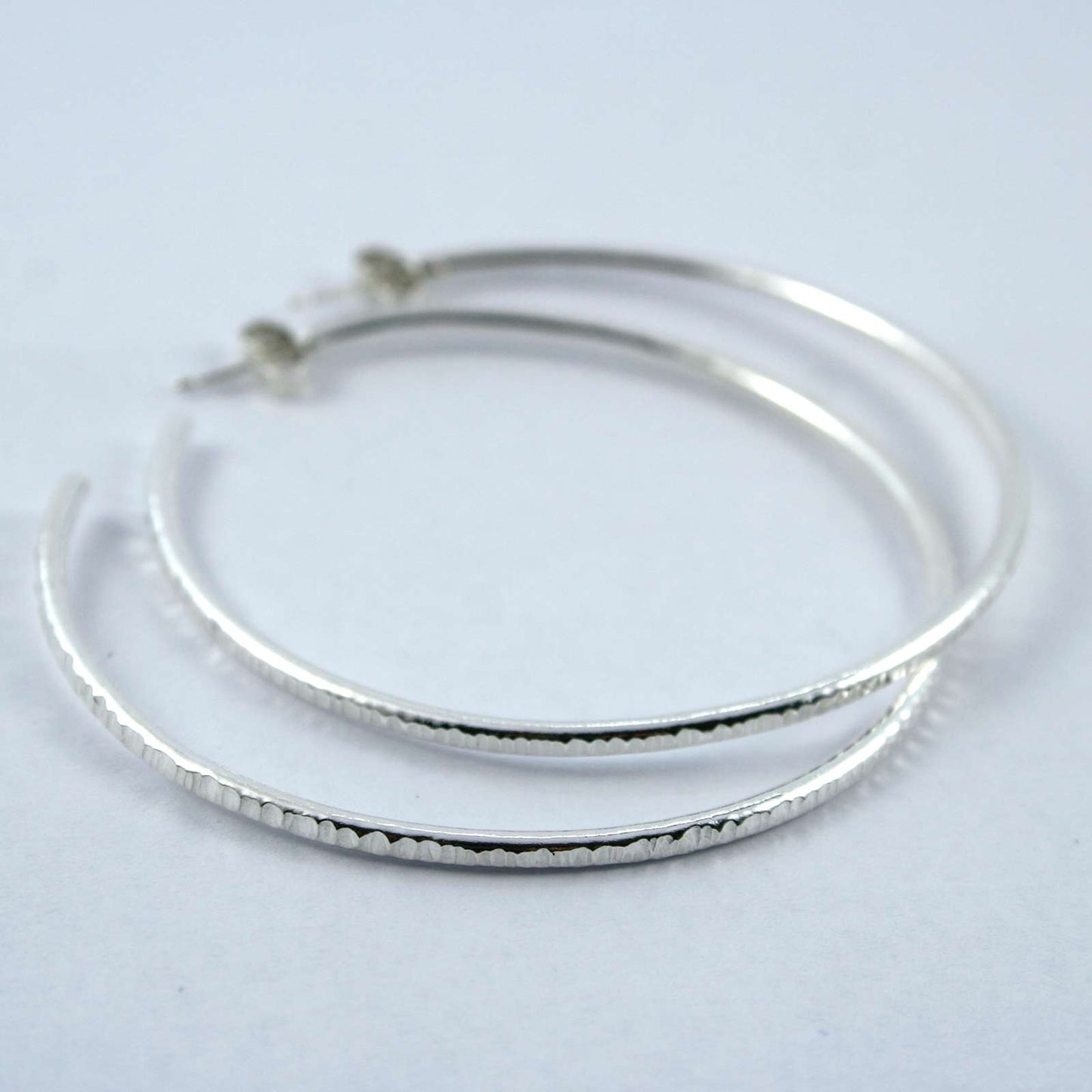 Hammered sterling silver hoop earrings