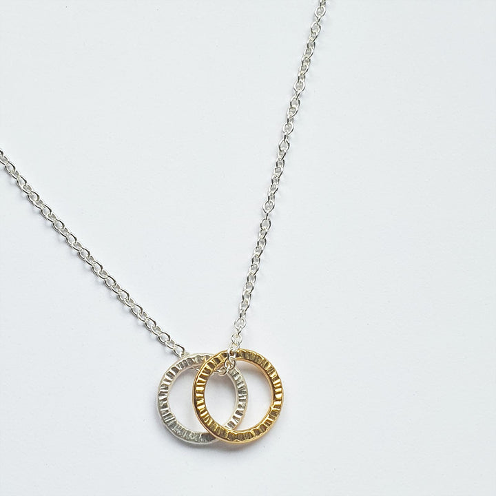 Circles necklace in gold and silver