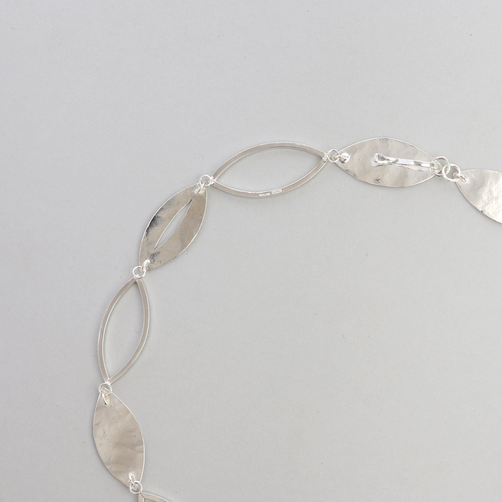 Reverse view of the handcrafted Marquise Statement Necklace showing the integrated concealed clasp designed to blend seamlessly into the necklace for secure, easy fastening.