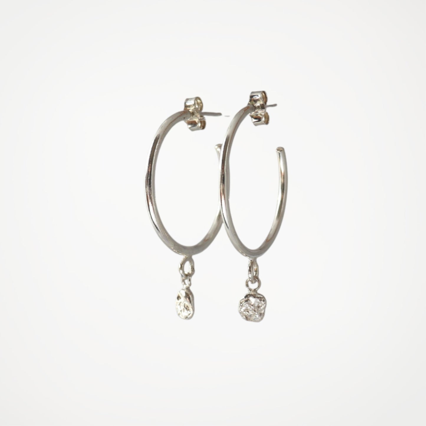 Handmade sterling silver hoop earrings from the Molten Drops collection