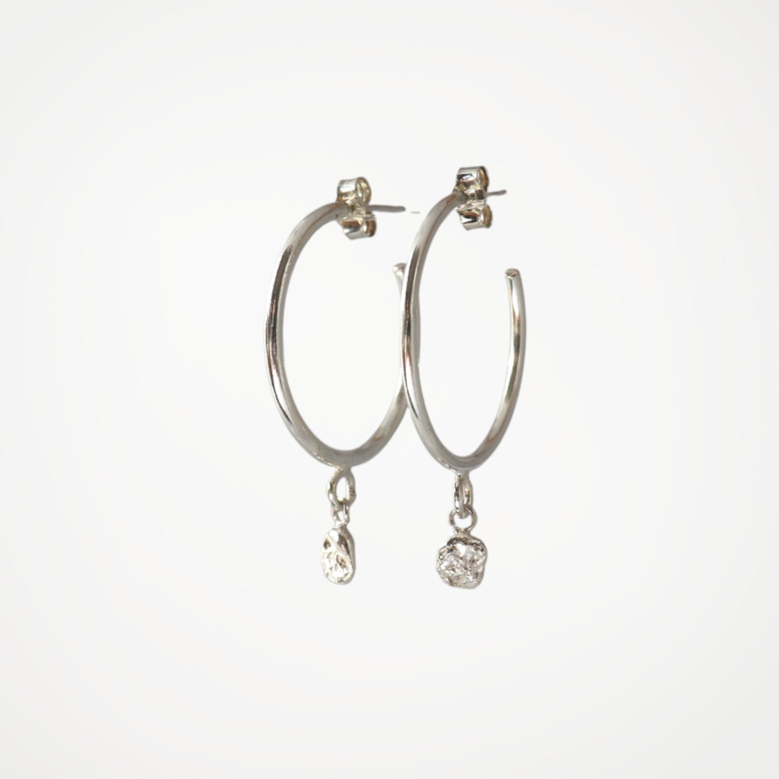 Handmade sterling silver hoop earrings from the Molten Drops collection