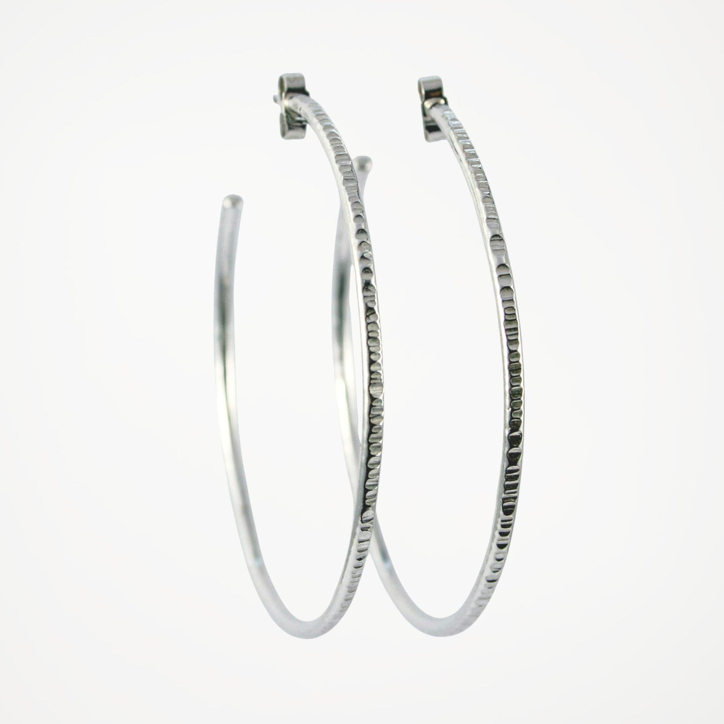Large textured sterling silver hoop earrings