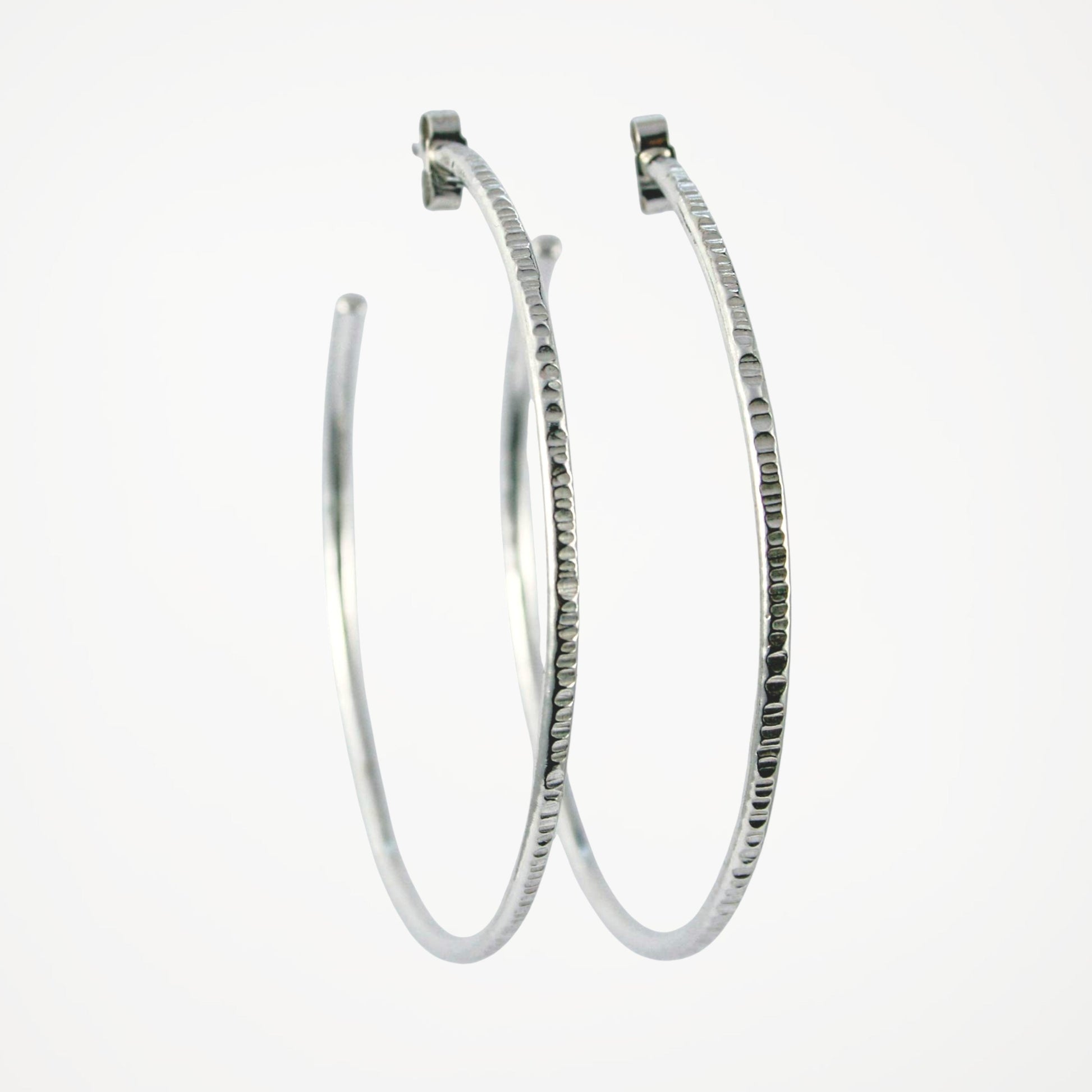 Large textured sterling silver hoop earrings