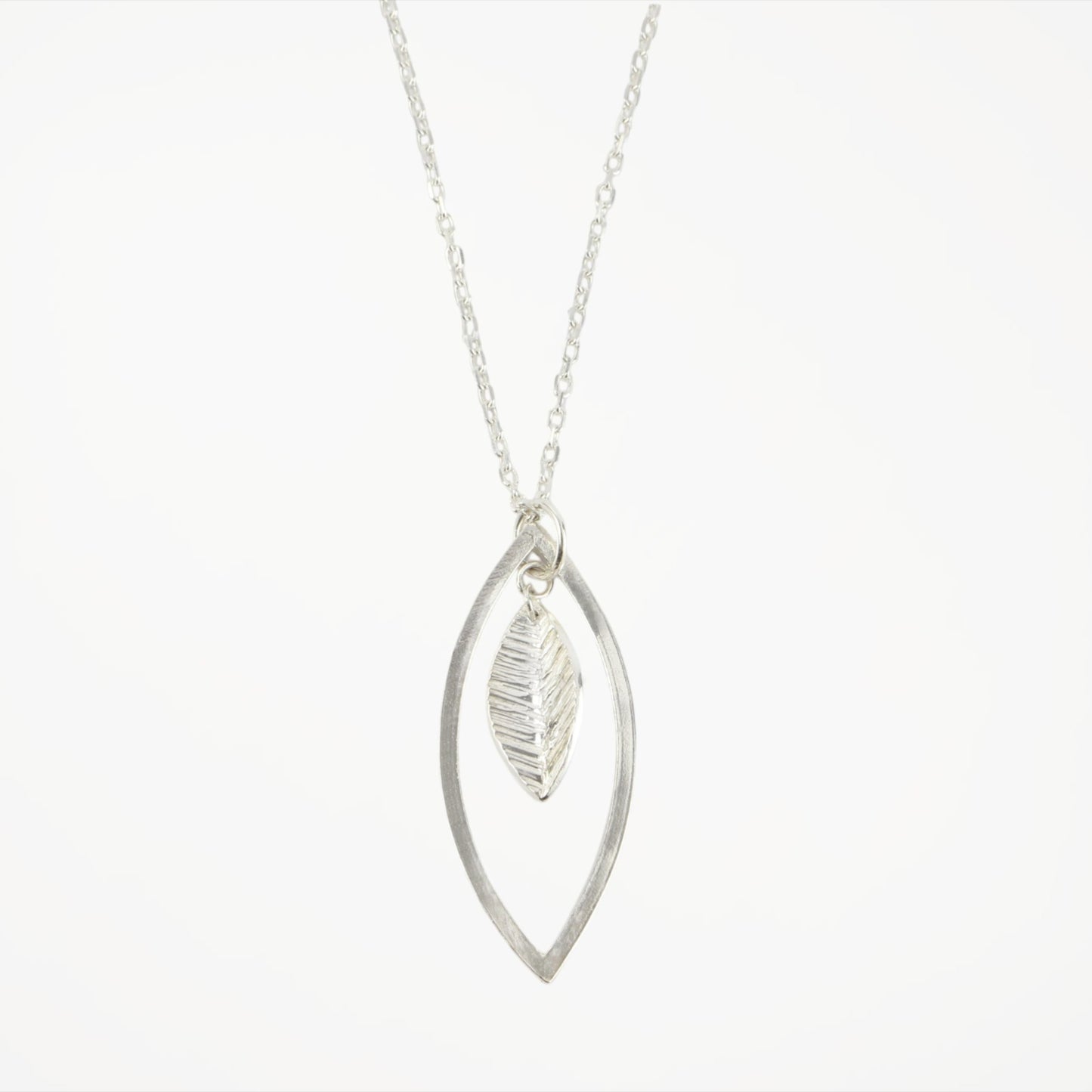 marquise open necklace with textured leaf in silver
