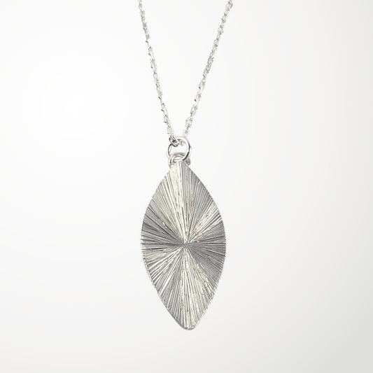 engraved marquise shaped sterling silver pendant on stilver necklace