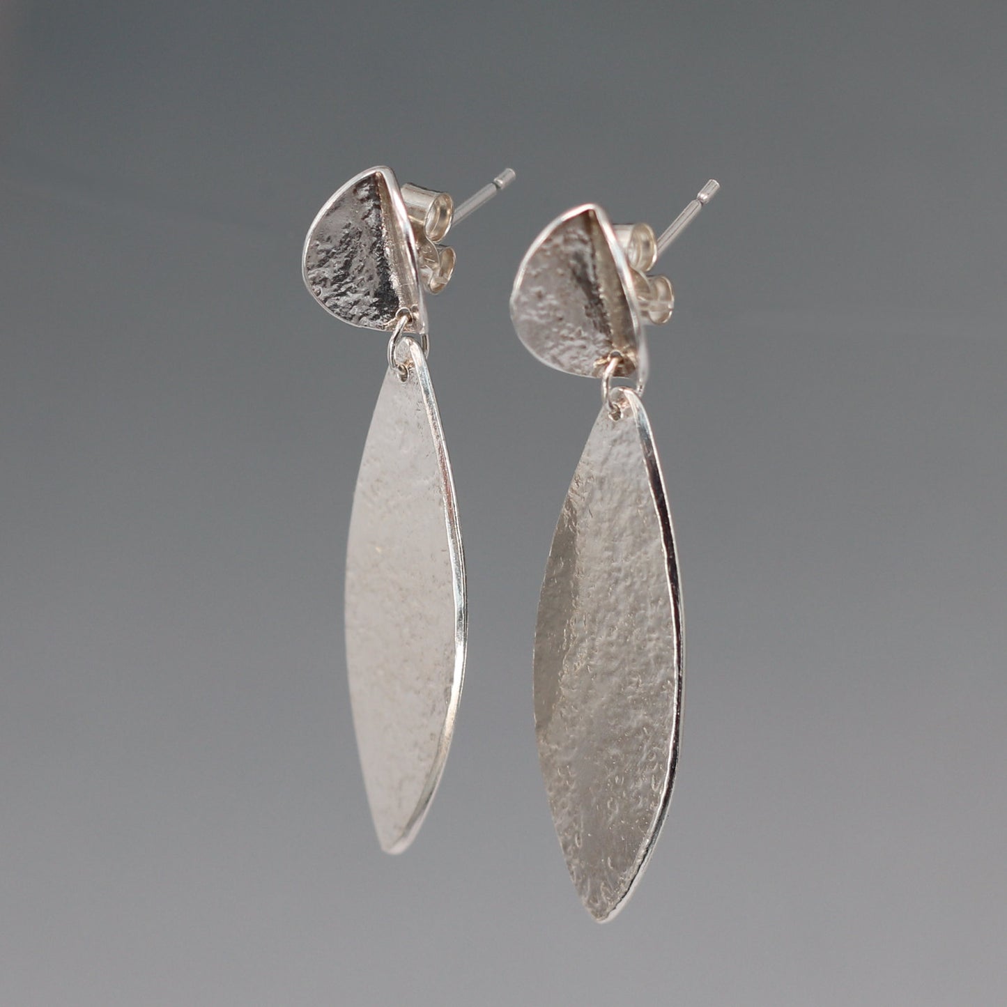 Pair of long folded sterling silver teardrop earrings