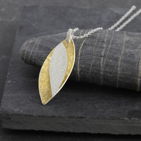 Handcrafted sterling silver marquise pendant with 24ct gold Keum-Boo detail by Jenny Holdsworth