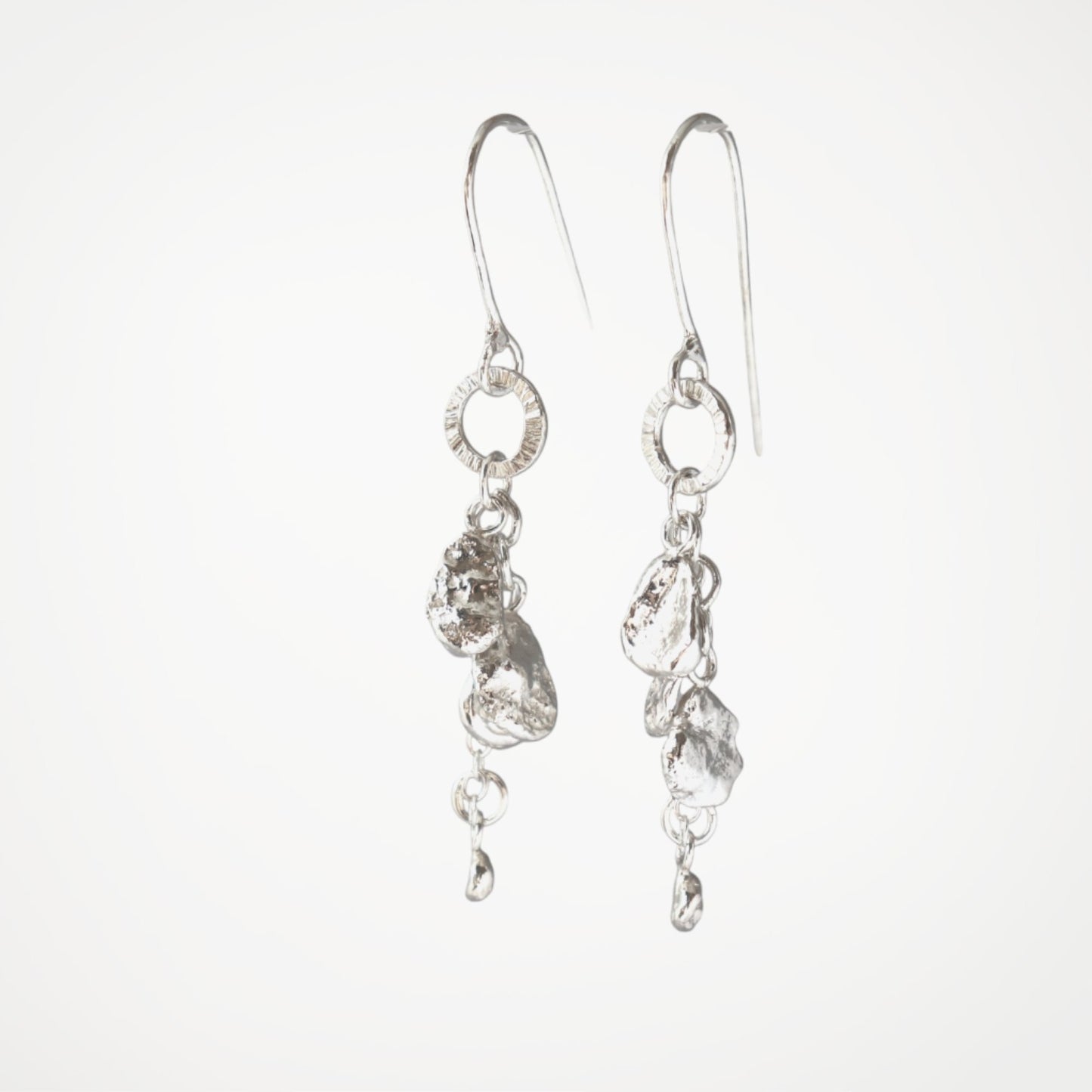 Molten Drops silver drop earrings with molten silver details