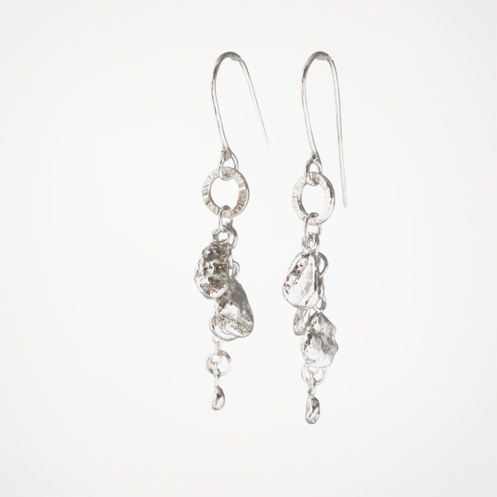 Molten Drops silver drop earrings with molten silver details