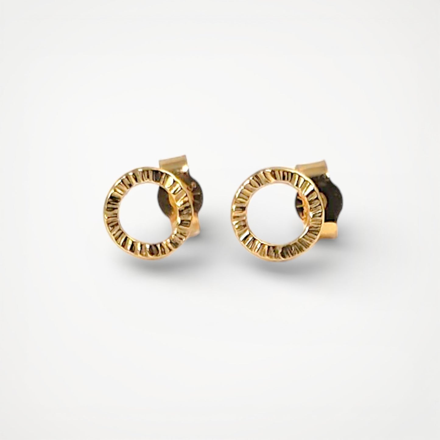 Tiny circle stud earrings gold