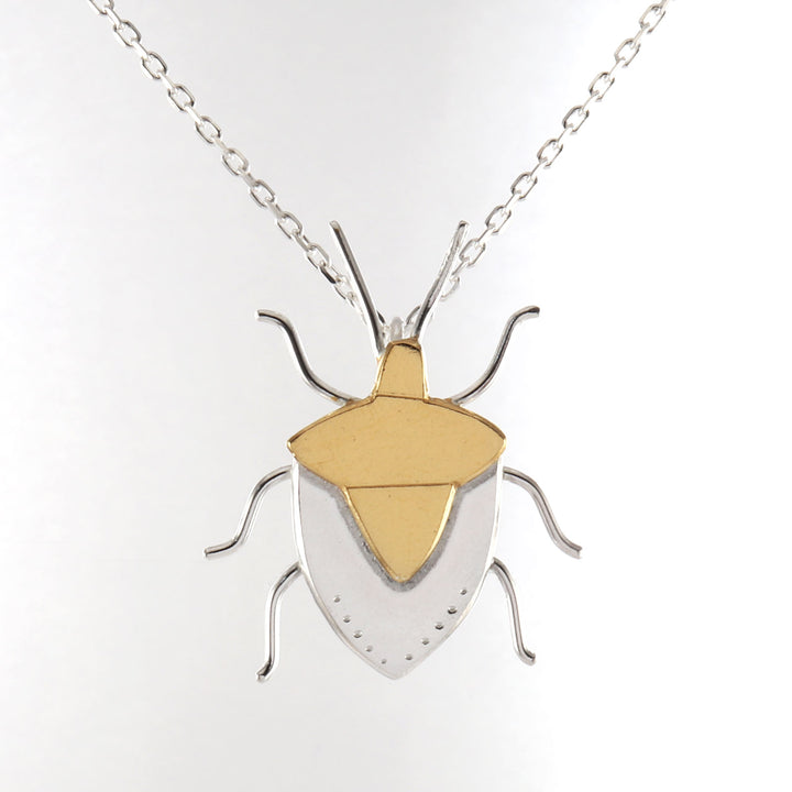 Shield bug necklace