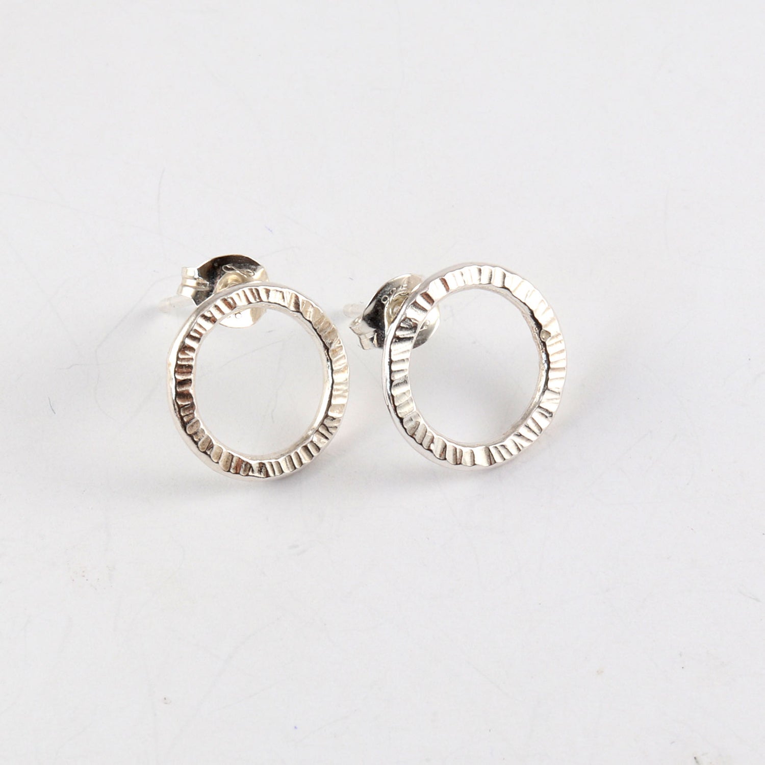 Small sterling silver circle stud earrings