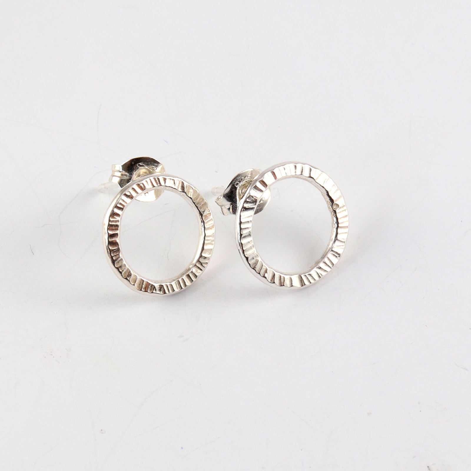 Small sterling silver circle stud earrings